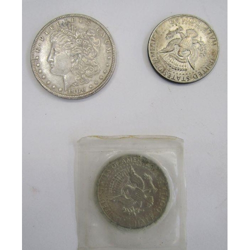 444 - United States 1900 Morgan Dollar, very fine, with two Kennedy Half Dollars 1967 & 1968