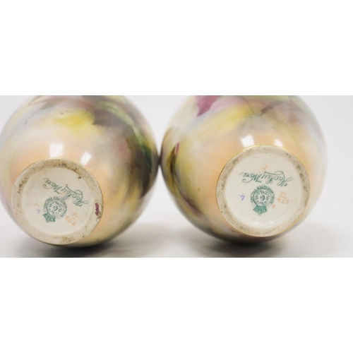 88 - Pair of early 20th century Royal Worcester Hadley Ware oviform vases and covers, printed green marks... 