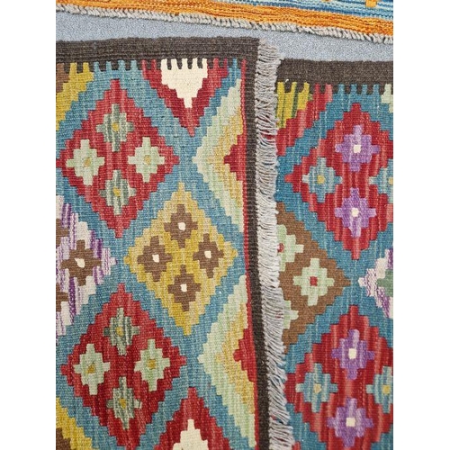 1031 - Blue ground Maimana kilim runner with one central row of nine lozenge floral medallions flanked by t... 