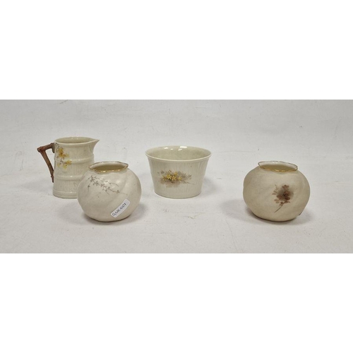 21 - Early 20th century Royal Worcester ivory-ground milk jug and a sugar-bowl painted with a robin by W.... 