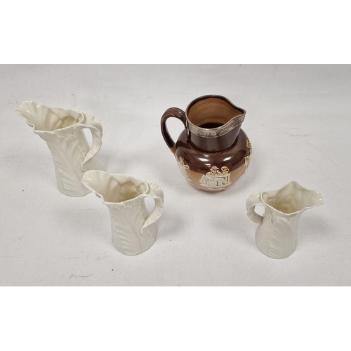 22 - Doulton Lambeth silver-mounted brown stoneware Harvest jug and three Royal Worcester leaf-shaped jug... 