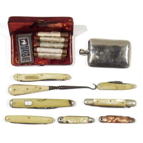 303 - Seven various folding penknives, some bone-handled, a bone-handled button hook, a miniature spirit f... 