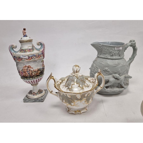 34 - Late 19th century Capodimonte-style urn-shaped two-handled vase and cover, a teacup and saucer simil... 