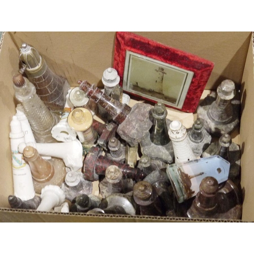 345 - Extensive collection of Cornish Serpentine model lighthouses in various materials, to include brass ... 