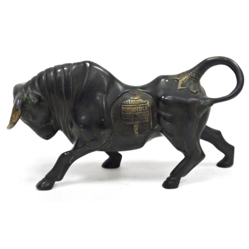 347 - Bronze and parcel-gilt model of a bull, 31cm x 18cm