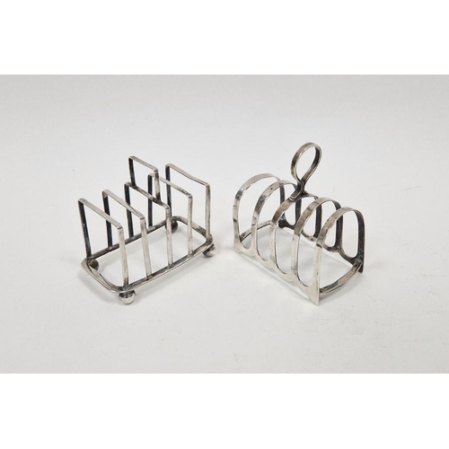 436 - Two silver toast racks, the first with ball feet, hallmarked Sheffield 1912, maker's marks for Hawks... 