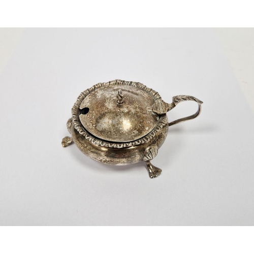 472 - White metal sugar casting spoon, fiddle pattern, and a silver mustard pot, circular, raised on three... 