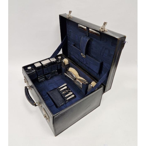 475 - George VI silver mounted vanity set by Walker and Hall, housed in original leather carry case, to in... 