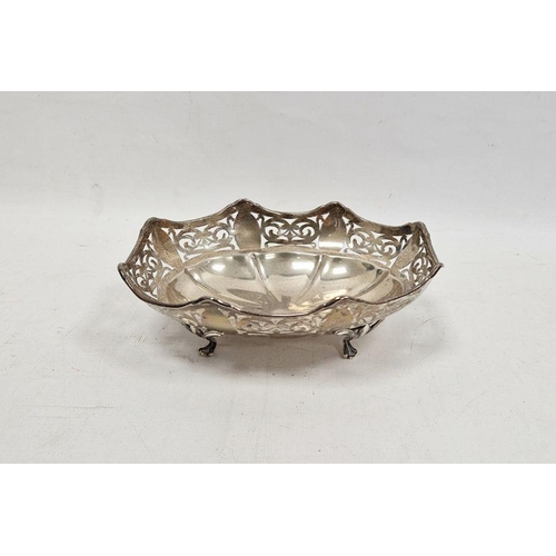 484 - George V silver footed oval bowl, with shaped rim pierced with interlocking scrolls and ovolos, rais... 