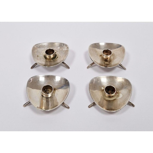 491 - Set of four mid century Danish silver-plated candle holders, each raised on three feet, 2cm high (4)