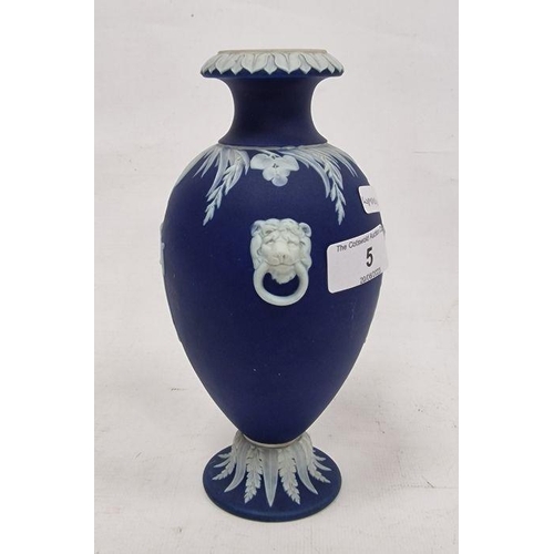 5 - Wedgwood dark blue jasperware oviform vase, circa 1890, impressed uppercase marks, decorated with wh... 