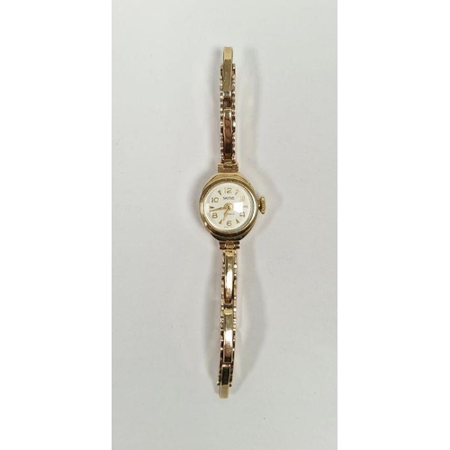 508 - Vintage lady's Smiths 9ct gold wristwatch, the circular dial with alternating Arabic and arrow hour ... 