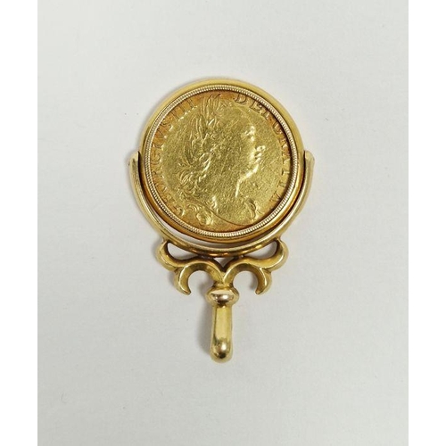 573 - George III gold guinea 1786 in Victorian 18ct gold swivel pendant with scroll surmount hallmarked Bi... 