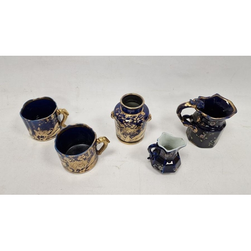 65 - Group of early 19th century Mason's Patent ironstone blue-ground mugs, jugs and a teacaddy, impresse... 