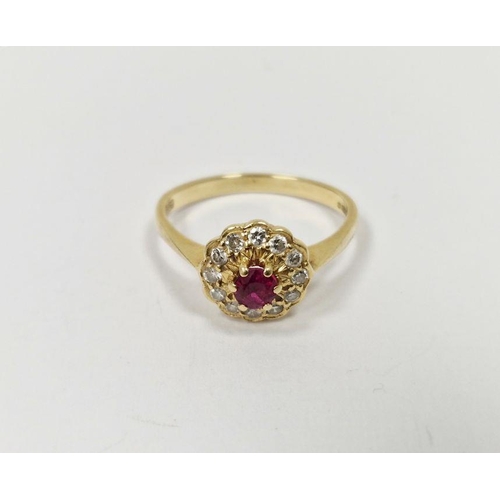 668 - 18ct gold, red and white stone cluster dress ring, the central stone possibly a ruby