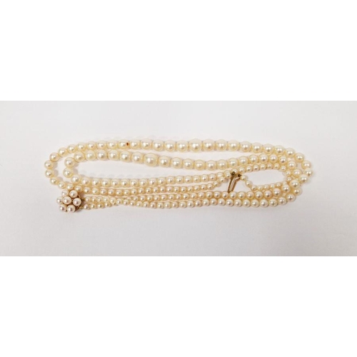 671 - Double string of graduated cultured pearls on 9ct gold pearl set clasp.