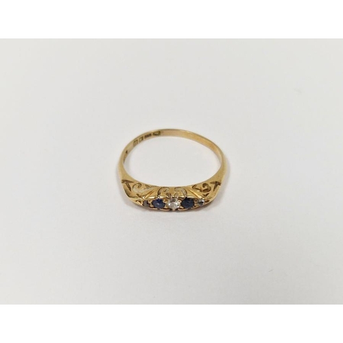 676 - 18ct gold sapphire and diamond ring set two sapphires and three small diamonds in scroll setting, so... 