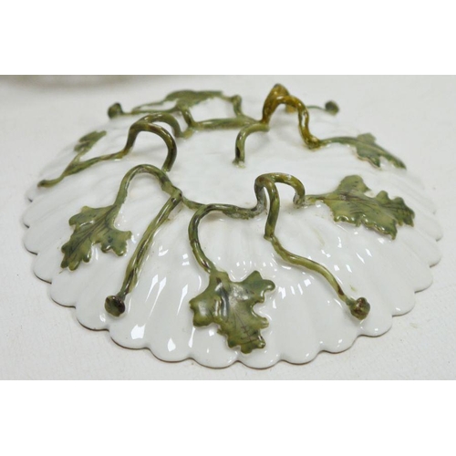 71 - Group of mid to late 19th century Continental porcelain, including: a footed shaped oval inkstand pa... 