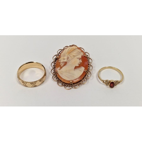 739 - 9ct gold wedding band, engraved, 6.1g, a 9ct gold and garnet small dress and a 9ct gold cameo brooch... 