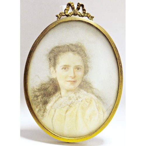 754 - Late 19th century school,
 Watercolour on ivory,
 A portrait miniature of a young lady, signed Nina ... 