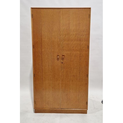 1055 - DM Letchworth Meredew mid century oak two door wardrobe, measuring approximately 176cm high by 92cm ... 