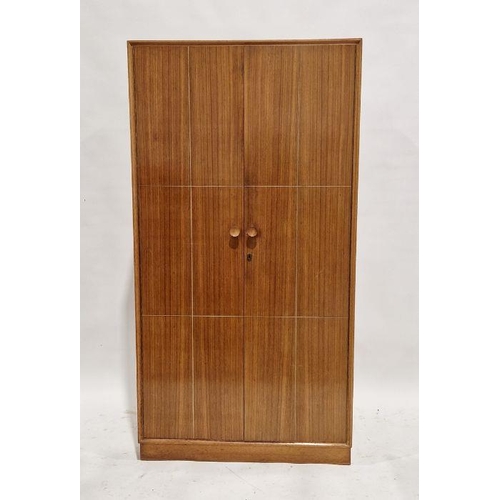 1055 - DM Letchworth Meredew mid century oak two door wardrobe, measuring approximately 176cm high by 92cm ... 