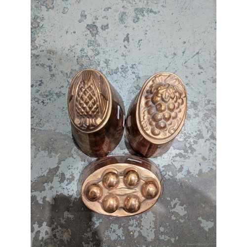 121 - Collection of late 19th/early 20th century copper jelly moulds including three marked for Colley abo... 