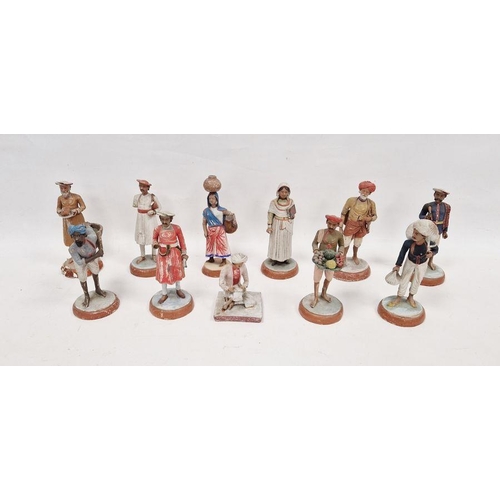 13 - 11 late 19th/early 20th century Indian painted terracotta and plaster figures of street sellers incl... 