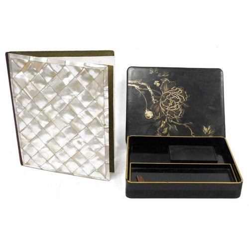 133 - Victorian/Edwardian mother-of-pearl desk blotter, folding and black papiermache backed, having mothe... 