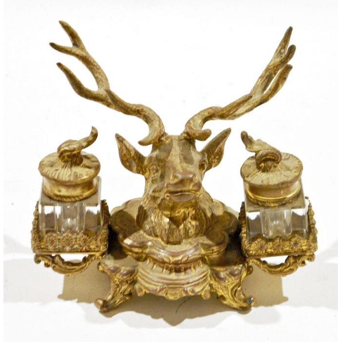 147 - 19th century gilt metal mounted double inkwell cast as a stag's head flanking two square section cut... 