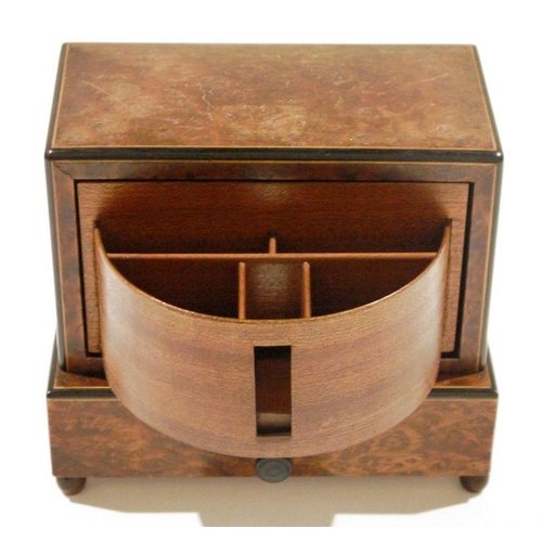 173 - Art Deco burr walnut musical cigarette dispenser of rectangular form with concealed semi-circular di... 