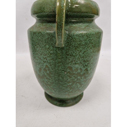 39 - C H Brannam Pottery Barum Ware green-ground two-handled oviform vase, early 20th century, incised CH... 