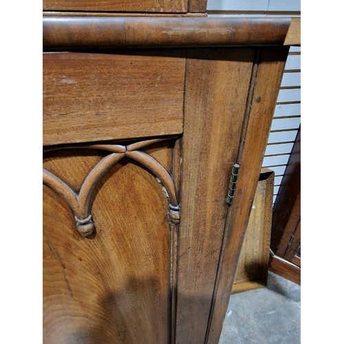 1054 - Victorian mahogany Gothic Revival-style library bookcase, having a moulded cornice over a pair of ba... 