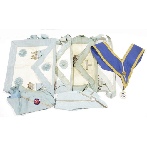 129 - Collection of Masonic aprons and collars, mid 20th century, white kid leather edged in pale blue wat... 