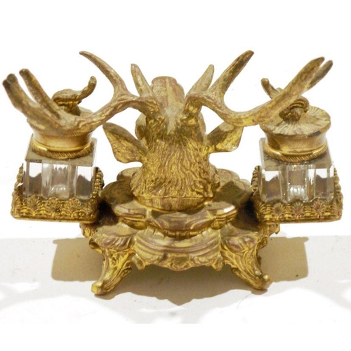 147 - 19th century gilt metal mounted double inkwell cast as a stag's head flanking two square section cut... 