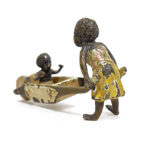 147A - Late 19th/early 20th century cold painted bronze figure group, depicting a lady pushing a child alon... 