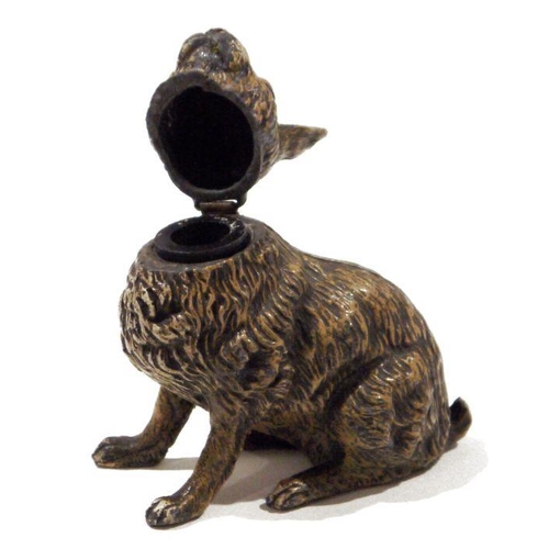 161 - Cold-painted white metal hare inkwell having hinged head, 14cm high