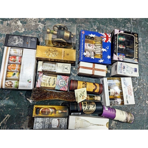 270A - Two boxes of spirit and liqueur gift sets in miniature and smaller sizes, with individual tubed whis... 