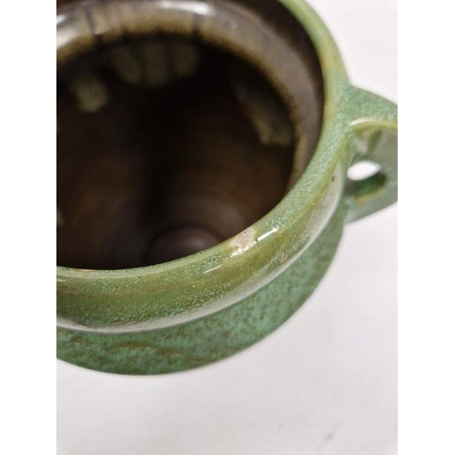 39 - C H Brannam Pottery Barum Ware green-ground two-handled oviform vase, early 20th century, incised CH... 