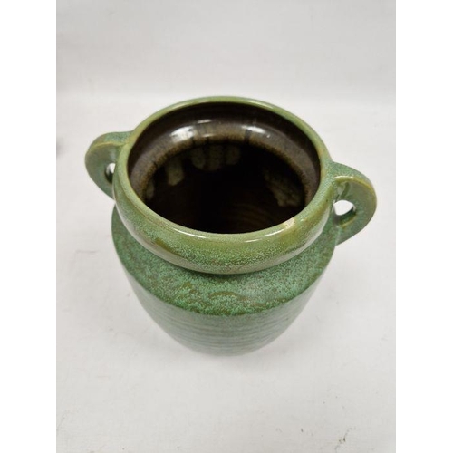 39 - C H Brannam Pottery Barum Ware green-ground two-handled oviform vase, early 20th century, incised CH... 