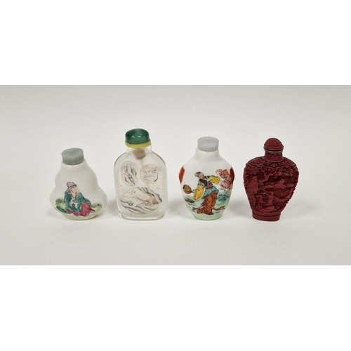 80 - Four Chinese snuff-bottles and stoppers, comprising: a reverse glass painted snuff-bottle decorated ... 