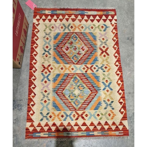 1028 - Chobi beige ground kilim with two central stepped lozenge medallions, multiple geometric borders 125... 