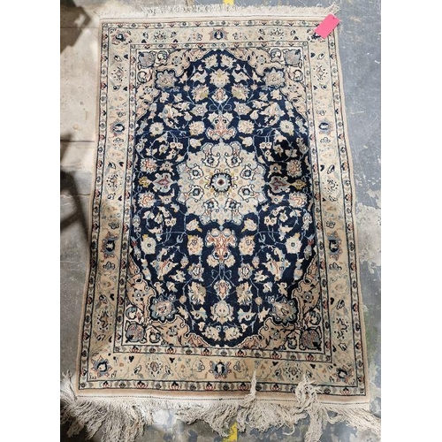 1030 - Persian blue ground handmade wool, cotton and silk 'Nain' rug with central floral medallion on woven... 