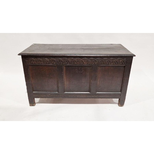 1050 - Antique stained oak coffer of rectangular form with carved floral frieze, 66cm high x 120cm wide x 5... 