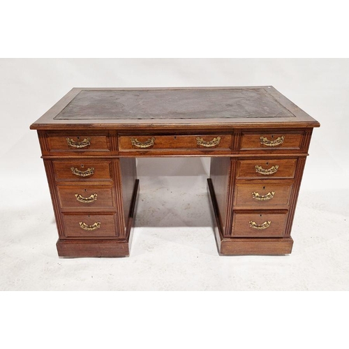 1068 - Victorian mahogany twin-pedestal desk with brass handles, having one long drawer flanked by single d... 