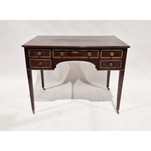 1103 - Early 20th century mahogany kneehole desk, the drawers having brass-bound borders with brass handles... 