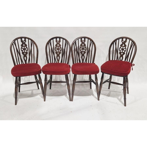 1110 - Set of four reproduction dark stained beech-framed wheelback windsor chairs (4)