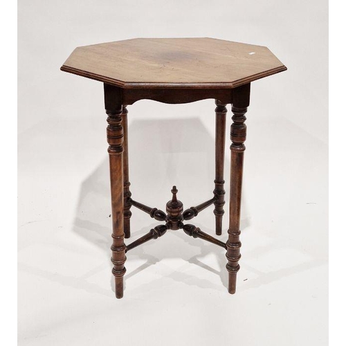 1142 - Victorian mahogany occasional table of octagonal form, raised on four tapering turned legs with a fo... 