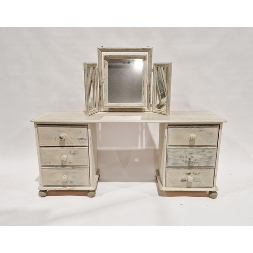 1144 - 20th century painted pine dressing table having six short drawers, each with turned wooden handles, ... 