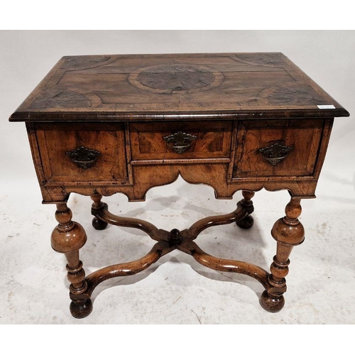 1243 - Late 17th/early 18th century walnut lowboy, the top having circular and quartered veneers with herri... 